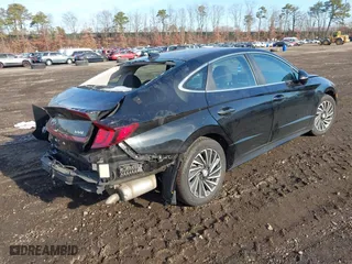 2021 Hyundai Sonata Hybrid SEL with VIN KMHL34JJ1MA027058, listed as a IAAI auction lot 41187431 with 39,437 mi miles. Bid and sale history available at carsss.com. Image 4.