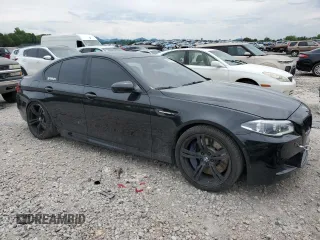 2016 BMW M5 z VIN WBSFV9C56GD595441, wystawiony jako Copart lot #59880955 z przebiegiem 109 018 mil mil oraz Szkoda całkowita • Salvage title. Historia ofert i sprzedaży dostępna na DreamBid. Obrazek 4.