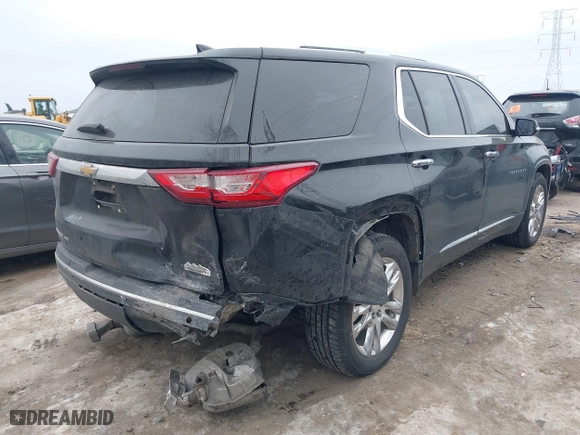 2018 Chevrolet Traverse High Country with VIN 1GNEVKKW0JJ101899, listed as a IAAI auction lot 41398396 with 107,055 mi miles. Bid and sale history available at carsss.com. Image 4.