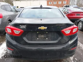 2017 Chevrolet Cruze LS z VIN 1G1BC5SM3H7138902, wystawiony jako IAAI lot #41546782 z przebiegiem 90 908 mil mil oraz . Historia ofert i sprzedaży dostępna na DreamBid. Obrazek 16.