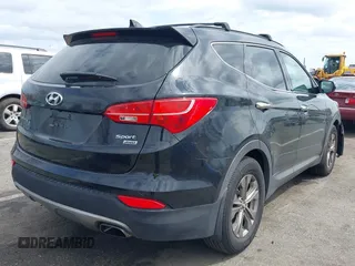 2014 Hyundai Santa Fe z VIN 5XYZUDLBXEG162476, wystawiony jako IAAI lot #41910671 z przebiegiem 146 607 mil mil oraz . Historia ofert i sprzedaży dostępna na DreamBid. Obrazek 4.