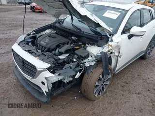 2019 Mazda CX-3 Grand Touring with VIN JM1DKFD76K0426879, listed as a IAAI auction lot 41669200 with 31,881 mi miles. Bid and sale history available at carsss.com. Image 6.