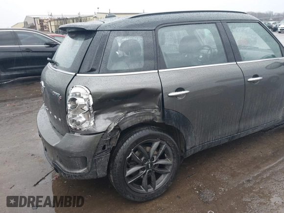 2014 MINI Countryman S z VIN WMWZC5C55EWP38431, wystawiony jako IAAI lot #41710523 z przebiegiem 153 441 mil mil oraz . Historia ofert i sprzedaży dostępna na DreamBid. Obrazek 6.