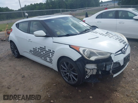 2013 Hyundai Veloster w/Gray Int z VIN KMHTC6AD3DU131703, wystawiony jako IAAI lot #42468831 z przebiegiem 188 513 mil mil oraz . Historia ofert i sprzedaży dostępna na DreamBid. Obrazek 1.