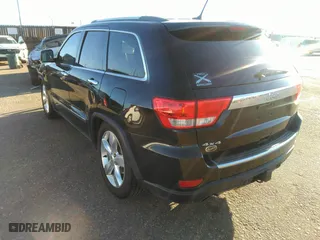 2012 Jeep Grand Cherokee Overland with VIN 1C4RJFCT8CC268410, listed as a IAAI auction lot 41823909 with 205,940 mi miles. Bid and sale history available at carsss.com. Image 3.