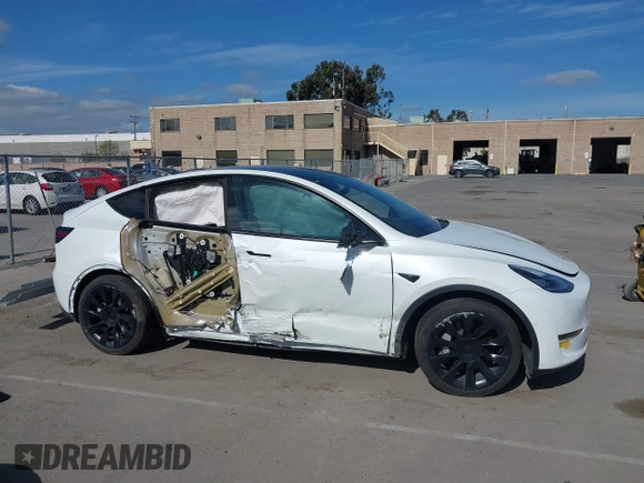 2022 Tesla Model Y Long Range with VIN 7SAYGDEE0NF340822, listed as a IAAI auction lot 41881224 with Not Provided miles and . Bid and sale history available at DreamBid. Image 14.