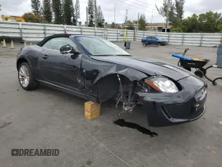 2011 Jaguar XK with VIN SAJWA4GB0BLB38875, listed as a Copart auction lot 52045805 with 35,487 mi miles and Salvage Title. Bid and sale history available at carsss.com. Image 4.