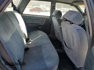 1990 Ford Taurus z VIN 1FACP5747LA124012, wystawiony jako Copart lot #85290054 z przebiegiem 118 017 mil mil oraz Czysty tytuł • Clean title. Historia ofert i sprzedaży dostępna na DreamBid. Obrazek 10.