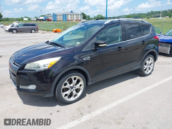 2013 Ford Escape Titanium with VIN 1FMCU9J90DUA01551, listed as a IAAI auction lot 42686247 with 190,707 mi miles and . Bid and sale history available at DreamBid. Image 2.