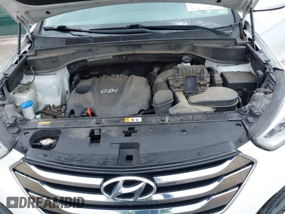 2014 Hyundai Santa Fe z VIN 5XYZTDLB5EG147354, wystawiony jako IAAI lot #42235940 z przebiegiem 107 466 mil mil oraz . Historia ofert i sprzedaży dostępna na DreamBid. Obrazek 10.
