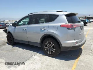 2017 Toyota RAV4 LE with VIN 2T3BFREV6HW658235, listed as a Copart auction lot 63409005 with 62,303 mi miles and Salvage title. Bid and sale history available at DreamBid. Image 2.
