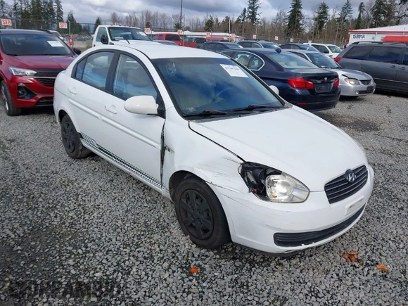 2006 Hyundai Accent GLS with VIN KMHCN46C36U009036, listed as a IAAI auction lot 41705369 with 134,328 mi miles. Bid and sale history available at carsss.com. Image 1.