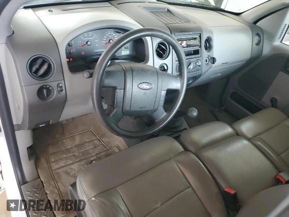 2007 Ford F-150 XL with VIN 1FTRF12297NA82401, listed as a Copart auction lot 58295705 with 198,470 mi miles and Salvage title. Bid and sale history available at DreamBid. Image 8.