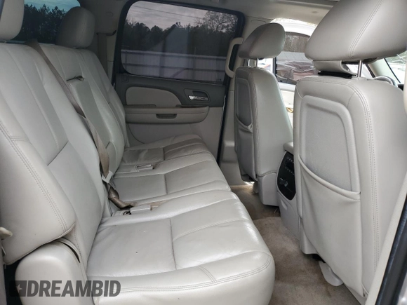 2014 Chevrolet Suburban LT z VIN 1GNSCJE00ER157634, wystawiony jako Copart lot #53271405 z przebiegiem 244 830 mil mil oraz Czysty tytuł • Clean title. Historia ofert i sprzedaży dostępna na DreamBid. Obrazek 11.