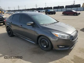 2015 Ford Focus SE with VIN 1FADP3F2XFL287593, listed as a Copart auction lot 51927795 with 110,911 mi miles and Salvage Title. Bid and sale history available at carsss.com. Image 4.