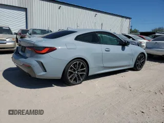 2022 BMW 4 Series 430i z VIN WBA53AP01NCH84963, wystawiony jako Copart lot #72785144 z przebiegiem Nie podano mil oraz Szkoda całkowita • Salvage title. Historia ofert i sprzedaży dostępna na DreamBid. Obrazek 3.