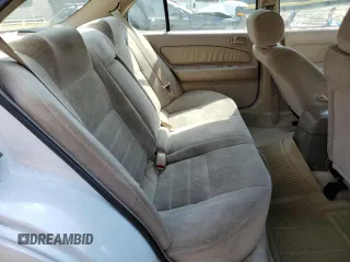 1997 Nissan Maxima GXE с VIN JN1CA21D1VT828042, выставлен на аукционе Copart как лот 52630475 с пробегом 351 073 миль миль и Списание • Salvage title. История ставок и продаж доступна на DreamBid. Изображение 10.