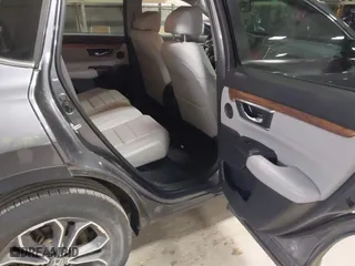 2021 Honda CR-V EX-L with VIN 2HKRW2H87MH673744, listed as a IAAI auction lot 41710643 with 31,700 mi miles. Bid and sale history available at carsss.com. Image 8.