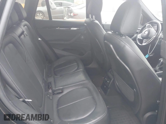 2017 BMW X1 xDrive28i with VIN WBXHT3C31H5F72958, listed as a IAAI auction lot 41782257 with 134,829 mi miles. Bid and sale history available at carsss.com. Image 8.