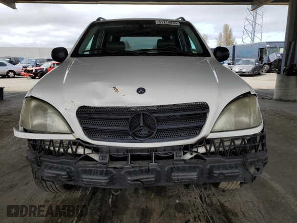1999 Mercedes-Benz M 320/430/500 with VIN 4JGAB54E9XA130876, listed as a Copart auction lot 51714835 with 191,810 mi miles and Salvage Title. Bid and sale history available at DreamBid. Image 5.