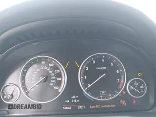 2015 BMW X4 xDrive28i with VIN 5UXXW3C51F0M86668, listed as a IAAI auction lot 42489071 with 59,694 mi miles and . Bid and sale history available at DreamBid. Image 7.