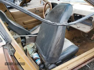 1979 Datsun 280ZX z VIN HGS130115983, wystawiony jako Copart lot #54709755 z przebiegiem 74 026 mil mil oraz Tytuł czysty. Historia ofert i sprzedaży dostępna na DreamBid. Obrazek 8.