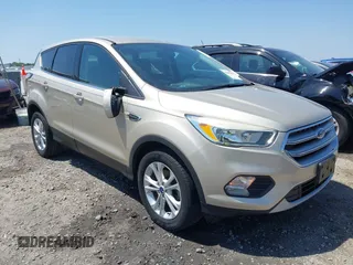 2017 Ford Escape SE with VIN 1FMCU0GD1HUD81299, listed as a IAAI auction lot 42063062 with 59,702 mi miles. Bid and sale history available at carsss.com. Image 1.