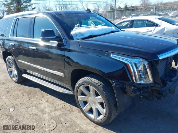 2019 Cadillac Escalade Premium Luxury with VIN 1GYS4CKJ0KR125240, listed as a IAAI auction lot 41568885 with 60,000 mi miles. Bid and sale history available at carsss.com. Image 1.