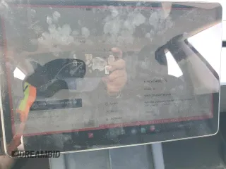 2023 Tesla Model 3 z VIN 5YJ3E1EA2PF652748, wystawiony jako Copart lot #57990705 z przebiegiem 37 922 mil mil oraz Szkoda całkowita • Salvage title. Historia ofert i sprzedaży dostępna na DreamBid. Obrazek 9.