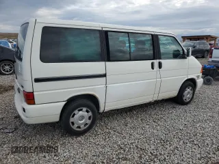 2000 Volkswagen EuroVan с VIN WV2MH4701YH035166, выставлен на аукционе Copart как лот 55680175 с пробегом 220 080 миль миль и Чистый • Clean title. История ставок и продаж доступна на DreamBid. Изображение 3.