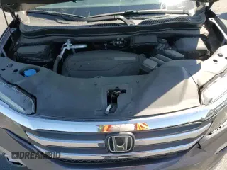 2018 Honda Pilot EX-L z VIN 5FNYF6H68JB062620, wystawiony jako Copart lot #64461045 z przebiegiem 61 021 mil mil oraz Szkoda całkowita • Salvage title. Historia ofert i sprzedaży dostępna na DreamBid. Obrazek 16.