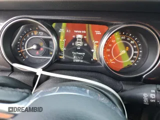 2021 Jeep Wrangler Unlimited Sahara с VIN 1C4HJXEG5MW731203, выставлен на аукционе Copart как лот 58005355 с пробегом 57 559 миль миль и Списание • Salvage title. История ставок и продаж доступна на DreamBid. Изображение 9.