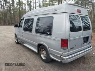 2002 Ford Econoline Cargo with VIN 1FDRE14W72HB82339, listed as a IAAI auction lot 41730429 with 214,165 mi miles and . Bid and sale history available at DreamBid. Image 3.