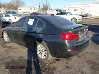 2018 BMW 3 Series 320i xDrive with VIN WBA8E5G57JNU47770, listed as a IAAI auction lot 41409122 with 62,198 mi miles. Bid and sale history available at carsss.com. Image 3.