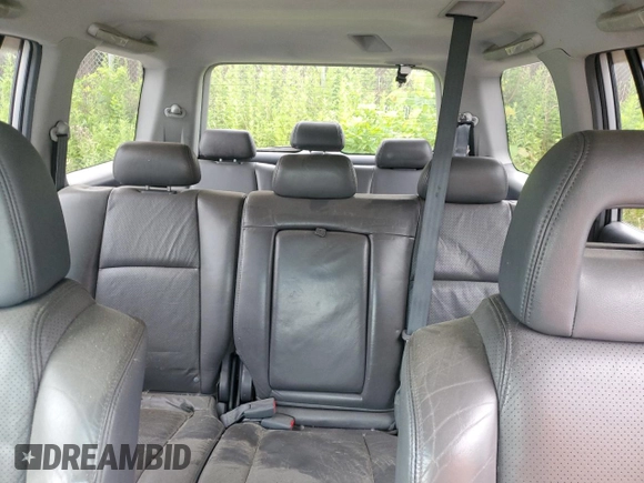 2003 Honda Pilot EX z VIN 2HKYF18763H581343, wystawiony jako Copart lot #60804525 z przebiegiem 236 636 mil mil oraz Szkoda całkowita • Salvage title. Historia ofert i sprzedaży dostępna na DreamBid. Obrazek 10.