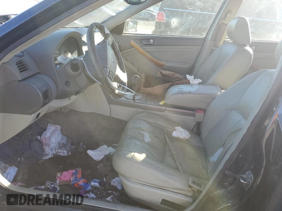 2003 Infiniti G35 w/Leather z VIN JNKCV51E23M015424, wystawiony jako Copart lot #87714105 z przebiegiem 174 773 mil mil oraz Szkoda całkowita • Salvage title. Historia ofert i sprzedaży dostępna na DreamBid. Obrazek 7.