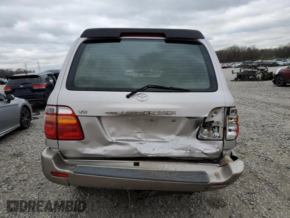 1999 Toyota Land Cruiser z VIN JT3HT05J6X0064313, wystawiony jako Copart lot #49555315 z przebiegiem 177 814 mil mil oraz Szkoda całkowita • Salvage title. Historia ofert i sprzedaży dostępna na DreamBid. Obrazek 6.