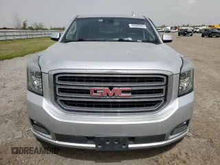 2019 GMC Yukon XL SLT with VIN 1GKS1GKC9KR288660, listed as a Copart auction lot 49669365 with 77,485 mi miles and Salvage Title. Bid and sale history available at carsss.com. Image 5.