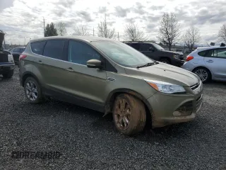 2013 Ford Escape SEL with VIN 1FMCU9H94DUD55370, listed as a Copart auction lot 52199415 with 79,462 mi miles and Salvage Title. Bid and sale history available at DreamBid. Image 4.