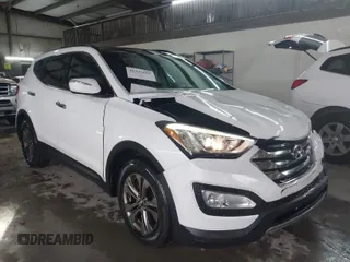 2014 Hyundai Santa Fe Sport with VIN 5XYZU3LB9EG140446, listed as a IAAI auction lot 41527693 with 129,610 mi miles. Bid and sale history available at carsss.com. Image 1.