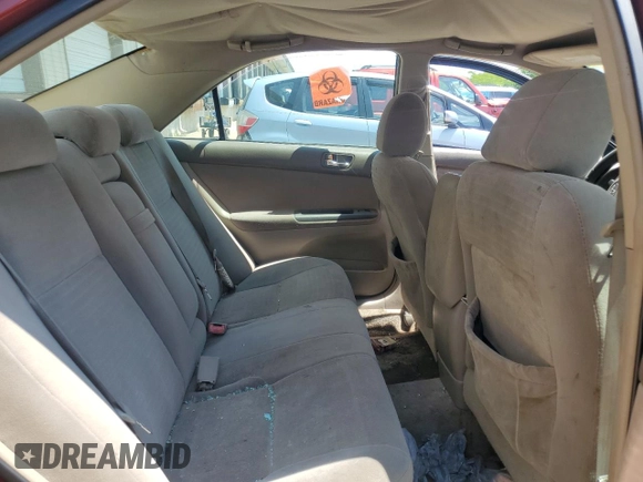 2005 Toyota Camry STD z VIN 4T1BE32K85U429361, wystawiony jako Copart lot #59214715 z przebiegiem 284 988 mil mil oraz Nie do naprawy • Non repairable. Historia ofert i sprzedaży dostępna na DreamBid. Obrazek 10.