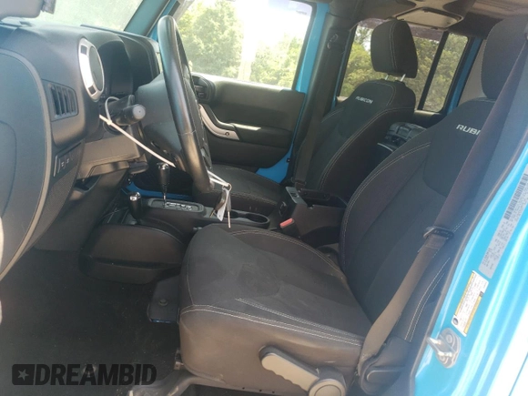 2018 Jeep Wrangler Unlimited Rubicon Recon with VIN 1C4BJWFGXJL887376, listed as a Copart auction lot 58753905 with 100,063 mi miles and Salvage title. Bid and sale history available at DreamBid. Image 7.