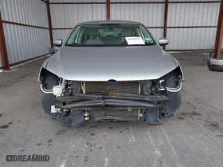 2014 Volkswagen Passat Wolfsburg Ed with VIN 1VWAS7A32EC036193, listed as a IAAI auction lot 41606595 with 77,536 mi miles. Bid and sale history available at carsss.com. Image 6.