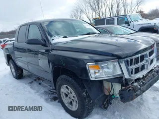 2008 Dodge Dakota SLT z VIN 1D7HW48K18S594442, wystawiony jako IAAI lot #41620423 z przebiegiem 144 590 mil mil oraz . Historia ofert i sprzedaży dostępna na DreamBid. Obrazek 1.