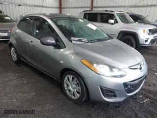 2013 Mazda Mazda2 Sport with VIN JM1DE1KY1D0167999, listed as a IAAI auction lot 41713546 with 204,443 mi miles. Bid and sale history available at carsss.com. Image 1.