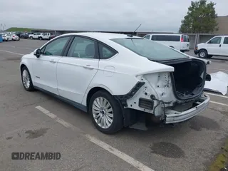 2015 Ford Fusion S Hybrid with VIN 3FA6P0UU2FR283244, listed as a IAAI auction lot 41740108 with 141,739 mi miles. Bid and sale history available at carsss.com. Image 3.
