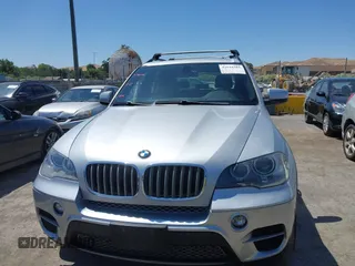2012 BMW X5 35d with VIN 5UXZW0C58CL671141, listed as a IAAI auction lot 42644381 with 127,464 mi miles and . Bid and sale history available at DreamBid. Image 12.