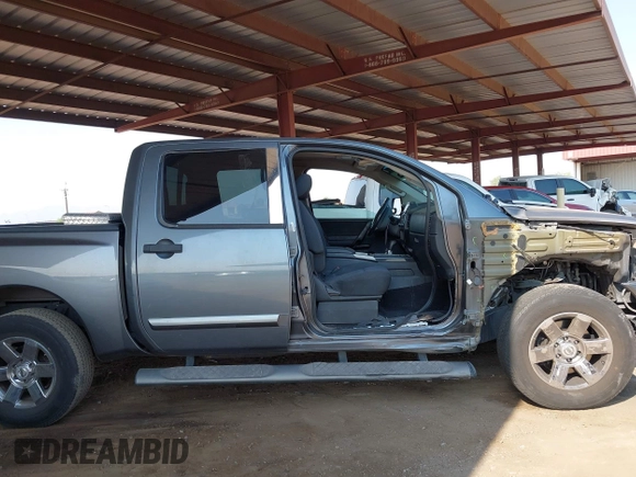 2013 Nissan Titan SL with VIN 1N6AA0ED0DN311415, listed as a IAAI auction lot 42697441 with 150,159 mi miles and . Bid and sale history available at DreamBid. Image 13.