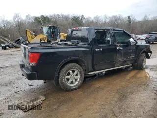 2011 Nissan Titan Pro-4X z VIN 1N6BA0EC2BN325891, wystawiony jako Copart lot #43241505 z przebiegiem Nie podano mil oraz Szkoda całkowita • Salvage title. Historia ofert i sprzedaży dostępna na DreamBid. Obrazek 3.