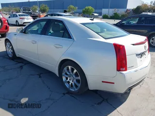 2008 Cadillac CTS RWD z VIN 1G6DV57V280142396, wystawiony jako IAAI lot #42086055 z przebiegiem 183 113 mil mil oraz . Historia ofert i sprzedaży dostępna na DreamBid. Obrazek 3.